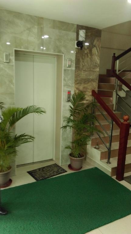 Metro Kochin Business Hotel Bagian luar foto